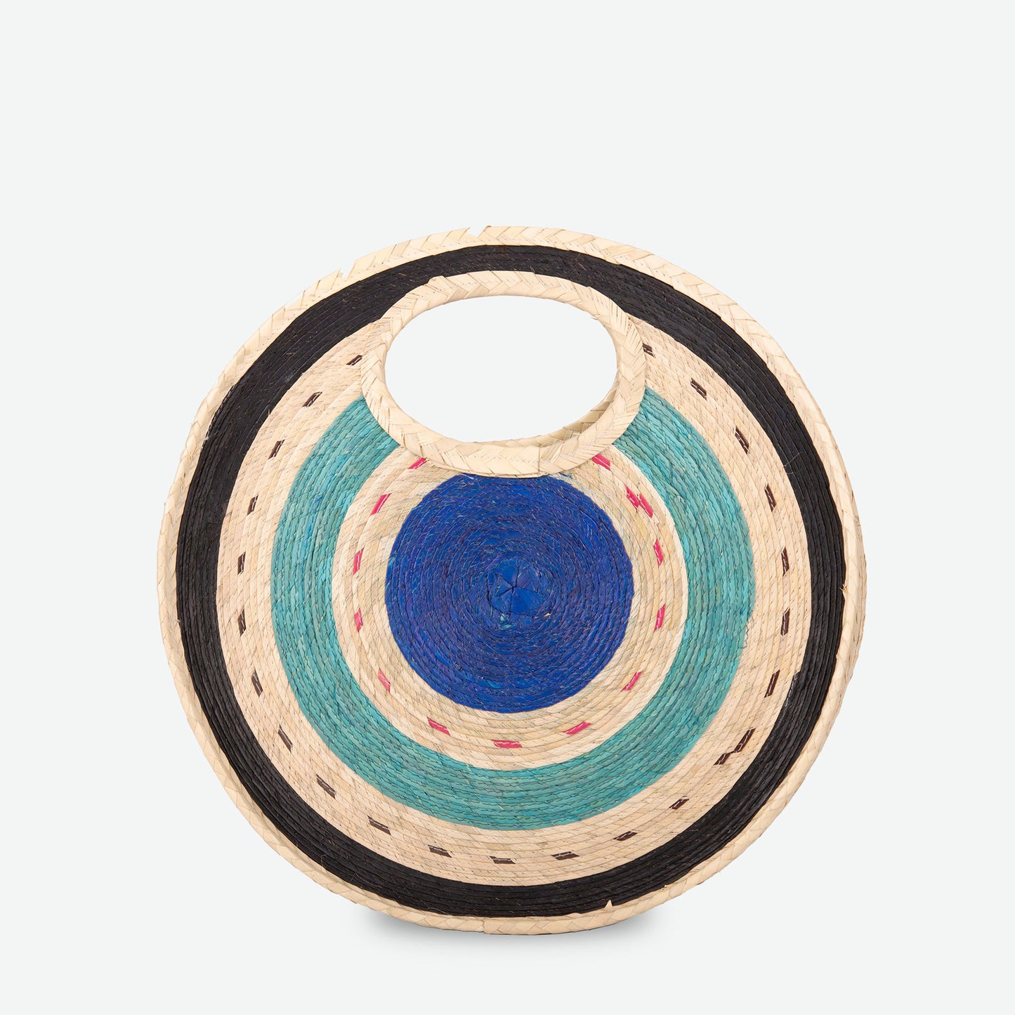 Round woven mat with concentric circles in blue, green, and beige on a white background