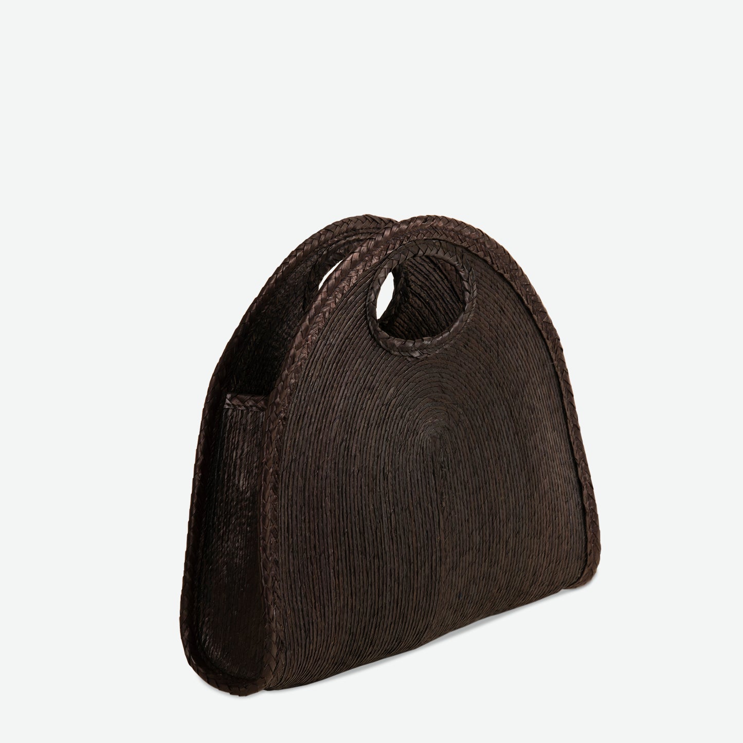 Black woven straw handbag on a light gray background